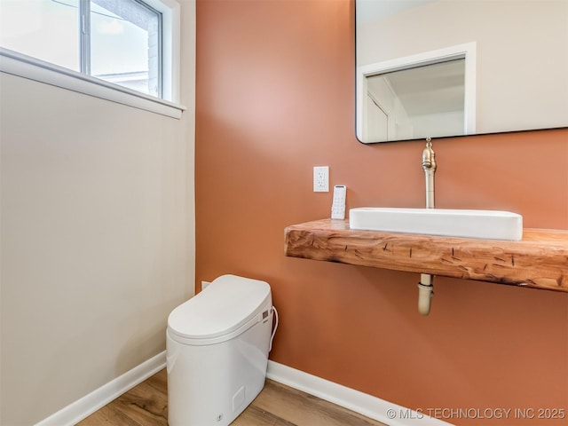 7446 E 20th St, Tulsa, OK 74112 - half bath with wood finished floors