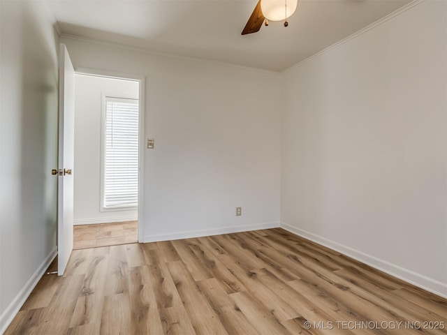 7446 E 20th St, Tulsa, OK 74112 - spare room featuring crown molding, wood finished floors, and ceiling fan