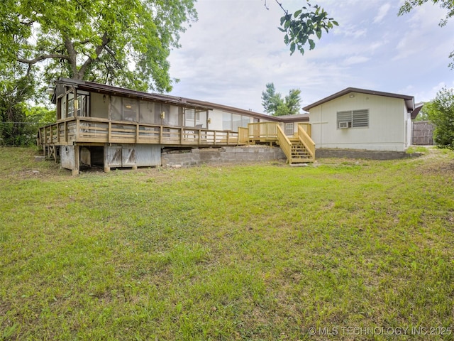 7446 E 20th St, Tulsa, OK 74112 - view of green lawn with a wooden deck and stairway