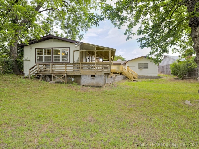 7446 E 20th St, Tulsa, OK 74112 - back of property featuring a wooden deck and stairway