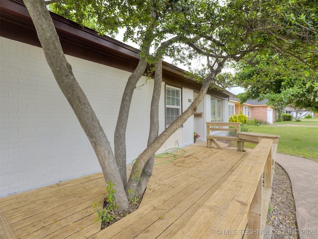 7446 E 20th St, Tulsa, OK 74112 - wooden terrace featuring a yard