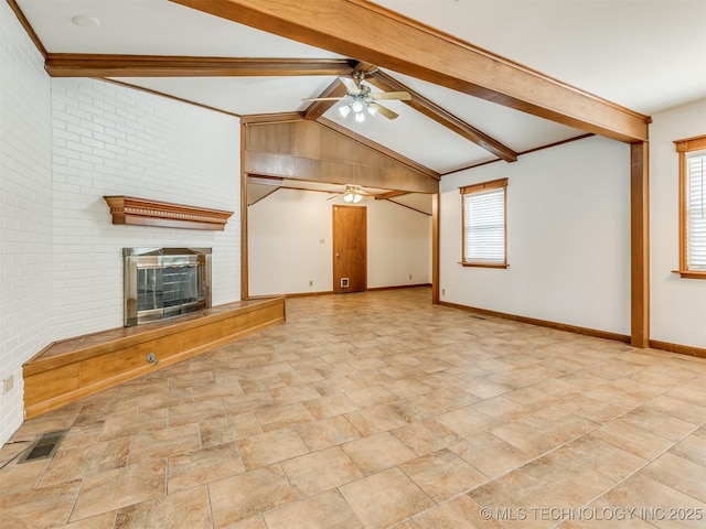 7446 E 20th St, Tulsa, OK 74112 - unfurnished living room featuring a ceiling fan, a fireplace, and stone finish flooring