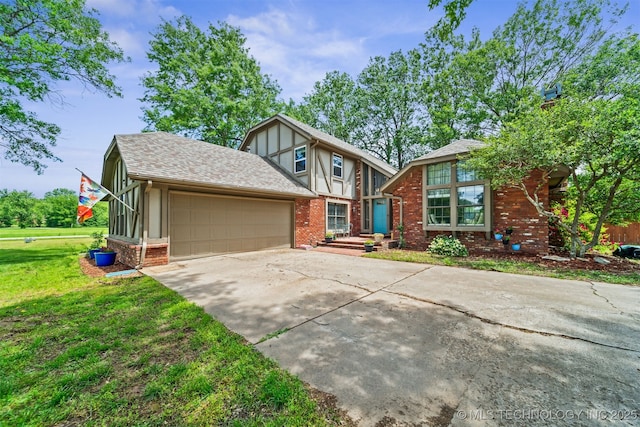 9599 E 155th Ave N, Owasso, OK 74055 - tudor home with a garage, driveway, brick siding, and a front yard