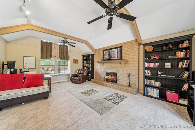 9599 E 155th Ave N, Owasso, OK 74055 - living area featuring a ceiling fan, carpet, vaulted ceiling, a brick fireplace, and rail lighting