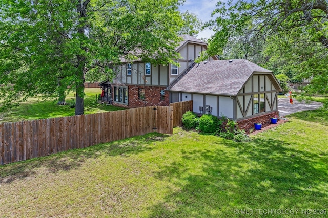 9599 E 155th Ave N, Owasso, OK 74055 - rear view of property featuring stucco siding and roof with shingles