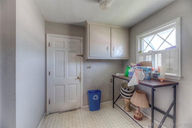 5102 S Columbia Ave, Tulsa, OK 74105 - laundry area with light flooring and baseboards