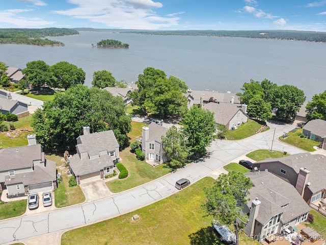 aerial perspective of suburban area featuring a large body of water