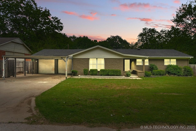 11815 S 86th E Ave, Bixby, OK 74008 - ranch-style home featuring an attached garage, concrete driveway, brick siding, and a carport