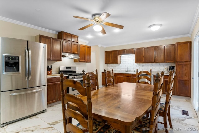 11815 S 86th E Ave, Bixby, OK 74008 - dining room featuring light marble finish floors, crown molding, and a ceiling fan