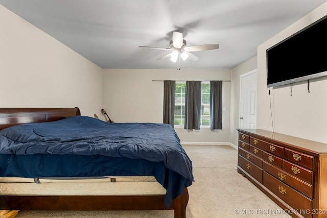 11815 S 86th E Ave, Bixby, OK 74008 - bedroom featuring light carpet, a ceiling fan, and baseboards