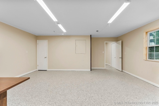 11815 S 86th E Ave, Bixby, OK 74008 - empty room with speckled floor and baseboards