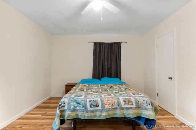 11815 S 86th E Ave, Bixby, OK 74008 - bedroom featuring light wood-style floors, baseboards, and a ceiling fan