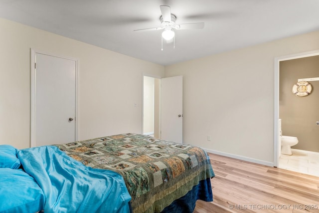 11815 S 86th E Ave, Bixby, OK 74008 - bedroom with ensuite bath, baseboards, light wood finished floors, and ceiling fan