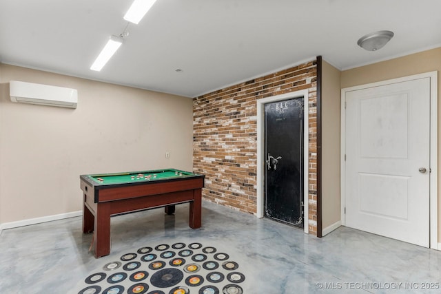 11815 S 86th E Ave, Bixby, OK 74008 - playroom featuring finished concrete flooring, a wall mounted air conditioner, brick wall, billiards, and baseboards