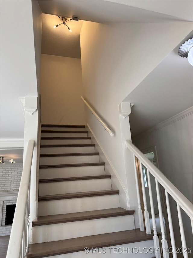 4601 S 66th Ave E, Tulsa, OK 74145 - staircase with a brick fireplace