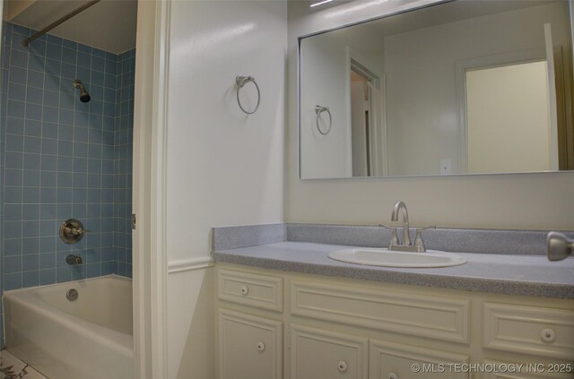 4601 S 66th Ave E, Tulsa, OK 74145 - bathroom featuring tub / shower combination and vanity