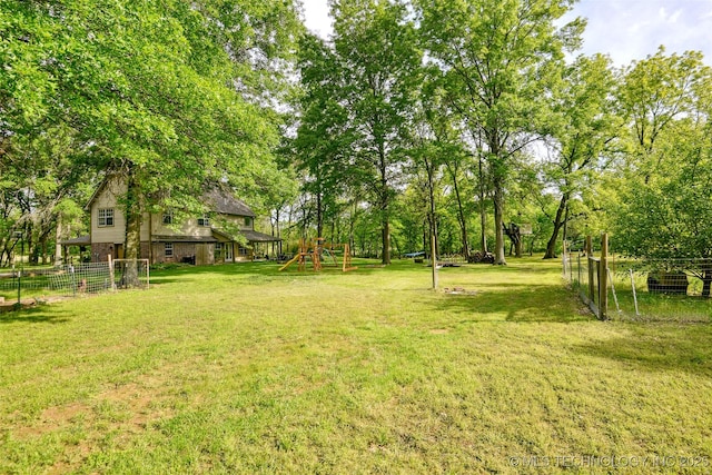 21304 S 4200th Rd, Claremore, OK 74019 - view of yard with a playground and view of scattered trees
