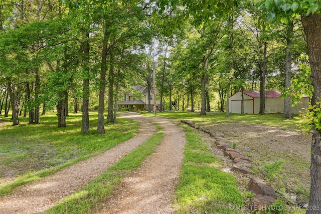 21304 S 4200th Rd, Claremore, OK 74019 - view of dirt / gravel driveway with a pole building