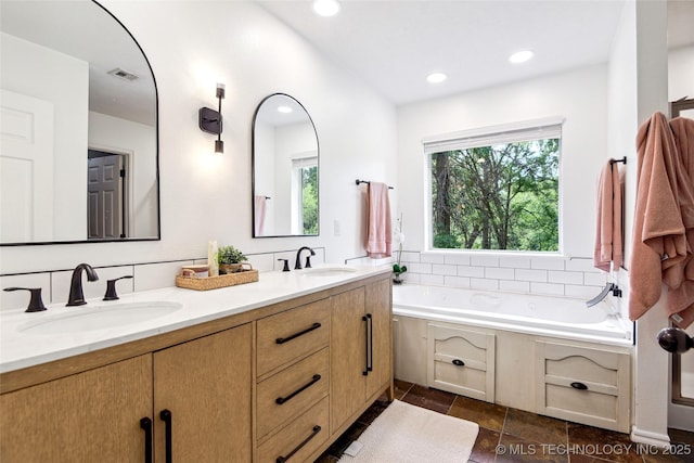 21304 S 4200th Rd, Claremore, OK 74019 - full bath featuring double vanity, a bath, and recessed lighting
