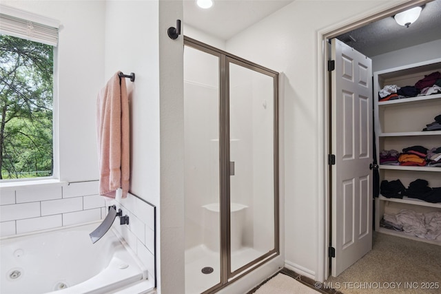 21304 S 4200th Rd, Claremore, OK 74019 - bathroom with a stall shower, plenty of natural light, and a jetted tub