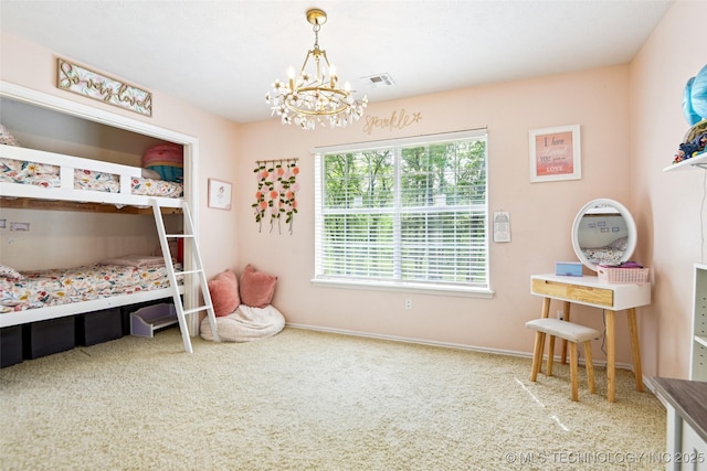 21304 S 4200th Rd, Claremore, OK 74019 - carpeted bedroom with a chandelier and baseboards