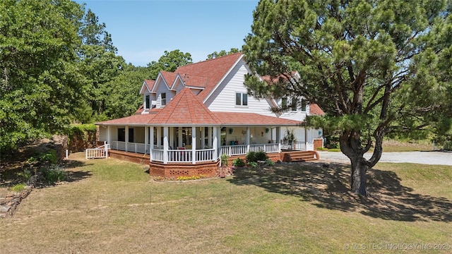 5094 N 209th W Ave, Sand Springs, OK 74063 - view of front of property featuring a porch and a front lawn