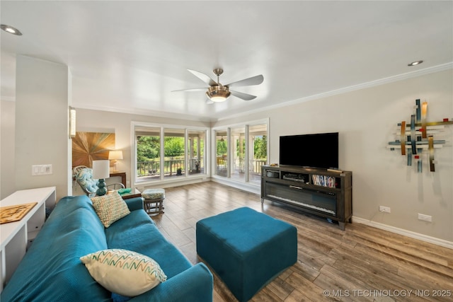 5094 N 209th W Ave, Sand Springs, OK 74063 - living room with ceiling fan, crown molding, wood finished floors, baseboards, and recessed lighting