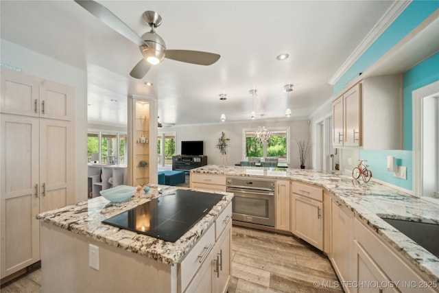 5094 N 209th W Ave, Sand Springs, OK 74063 - kitchen featuring stainless steel oven, ceiling fan, plenty of natural light, black electric stovetop, and recessed lighting