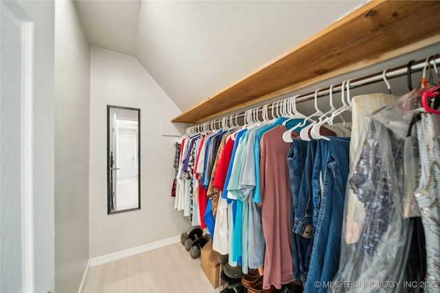 5094 N 209th W Ave, Sand Springs, OK 74063 - spacious closet featuring wood finished floors and vaulted ceiling