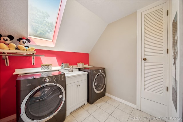 5094 N 209th W Ave, Sand Springs, OK 74063 - laundry room featuring cabinet space, washer and clothes dryer, and light tile patterned flooring