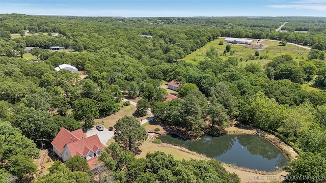 5094 N 209th W Ave, Sand Springs, OK 74063 - drone / aerial view of a heavily wooded area and a nearby body of water