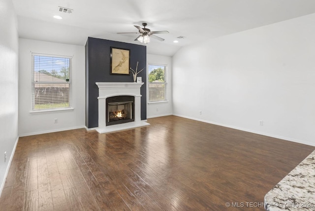 2805 W Fredericksburg St, Broken Arrow, OK 74011 - unfurnished living room featuring hardwood / wood-style flooring, plenty of natural light, ceiling fan, a warm lit fireplace, and recessed lighting