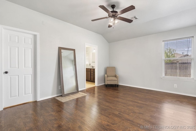 2805 W Fredericksburg St, Broken Arrow, OK 74011 - unfurnished bedroom featuring wood finished floors, vaulted ceiling, baseboards, a ceiling fan, and connected bathroom