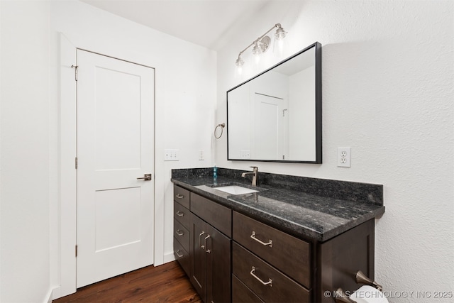 6345 W 53rd St, Tulsa, OK 74126 - bathroom with wood finished floors and vanity