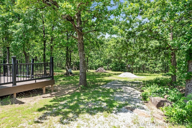 6345 W 53rd St, Tulsa, OK 74126 - view of yard with a wooden deck
