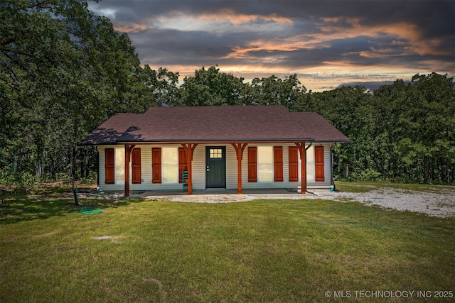 6345 W 53rd St, Tulsa, OK 74126 - ranch-style house featuring a porch and a yard