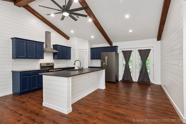 6345 W 53rd St, Tulsa, OK 74126 - kitchen with appliances with stainless steel finishes, wall chimney exhaust hood, blue cabinetry, a sink, and decorative backsplash