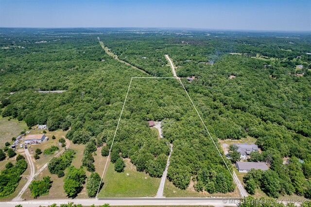 6345 W 53rd St, Tulsa, OK 74126 - aerial view of property's location featuring a heavily wooded area and property parcel outlined
