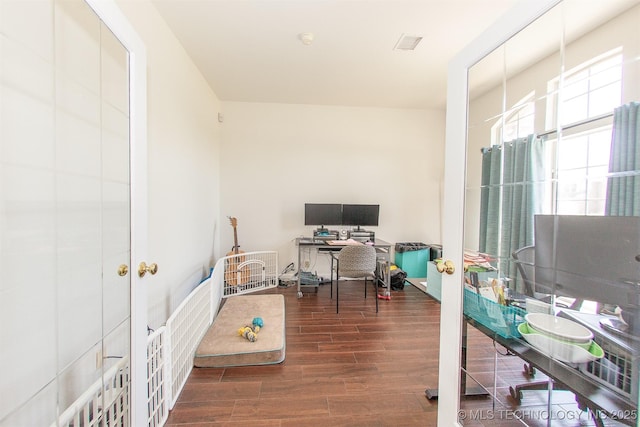 office space featuring french doors and wood finished floors