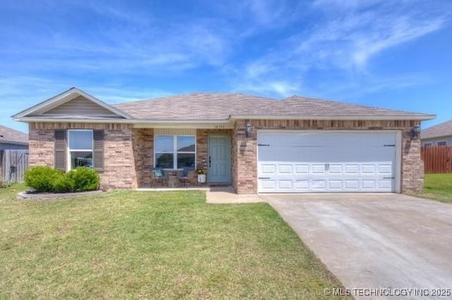 10195 E Kathy St, Claremore, OK 74019 - ranch-style house with driveway and a garage
