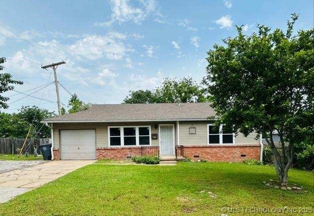 5215 E Latimer St, Tulsa, OK 74115 - single story home featuring an attached garage, brick siding, concrete driveway, and crawl space