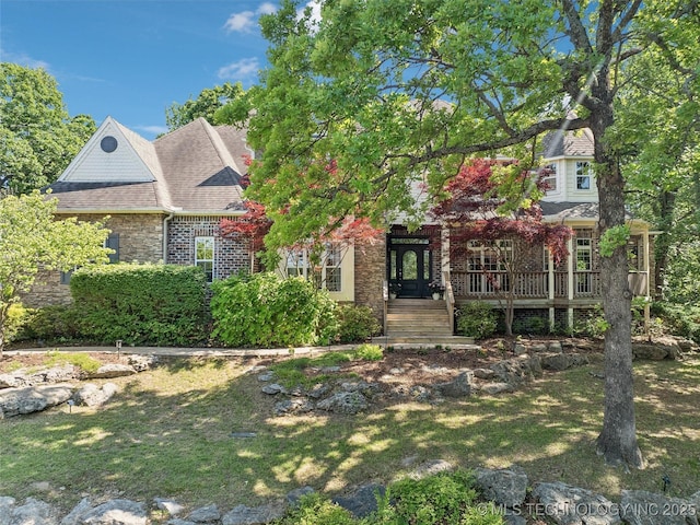 506 E 120th Pl S, Jenks, OK 74037 - view of front of property featuring a front lawn, roof with shingles, and brick siding