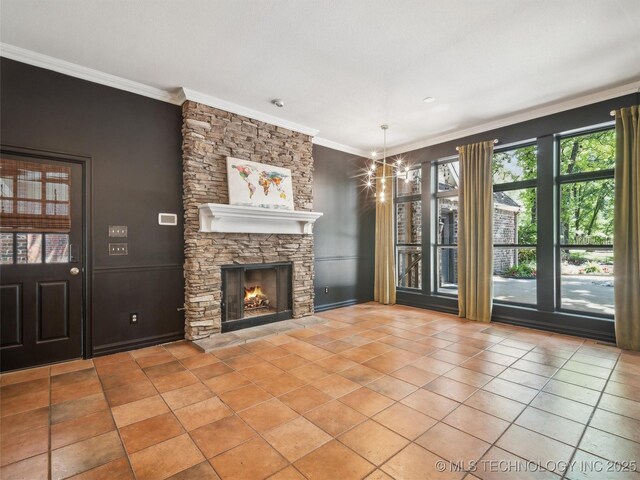 506 E 120th Pl S, Jenks, OK 74037 - unfurnished living room featuring ornamental molding, a stone fireplace, tile patterned flooring, and a chandelier