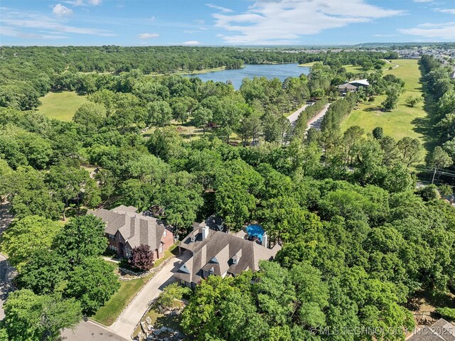 506 E 120th Pl S, Jenks, OK 74037 - aerial view of property and surrounding area featuring a nearby body of water and a heavily wooded area