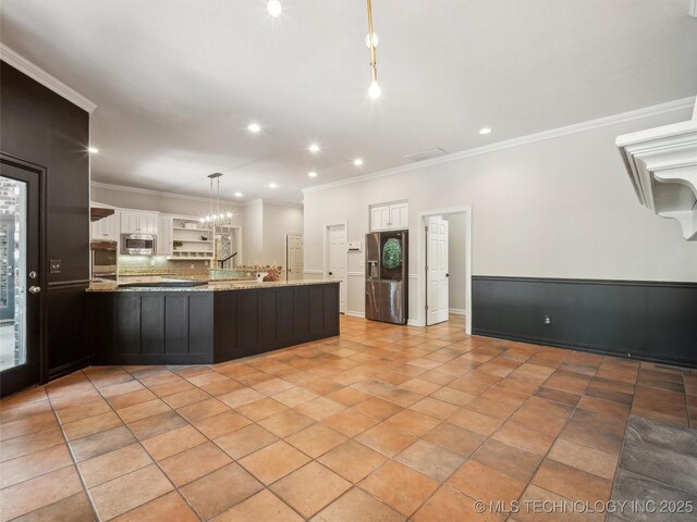 506 E 120th Pl S, Jenks, OK 74037 - kitchen featuring appliances with stainless steel finishes, a peninsula, open shelves, white cabinets, and crown molding
