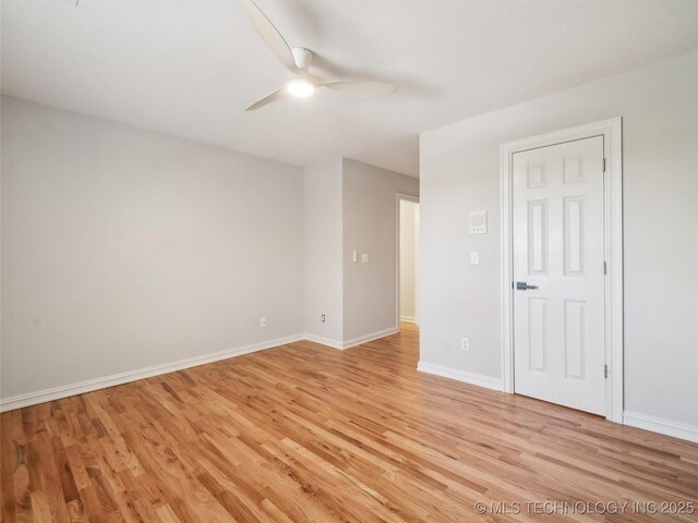506 E 120th Pl S, Jenks, OK 74037 - empty room with a ceiling fan, light wood-style flooring, and baseboards
