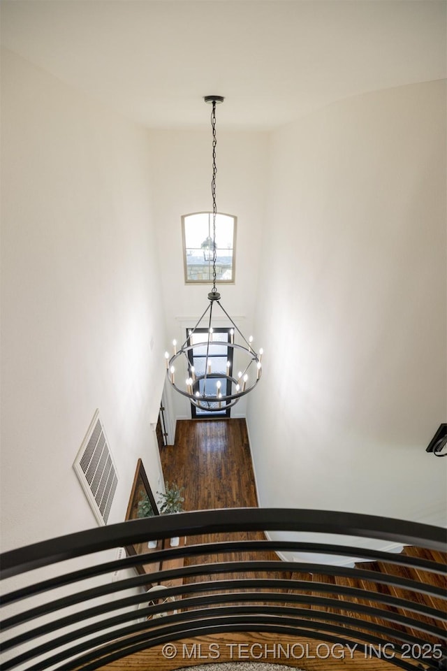 16958 E 45th St, Tulsa, OK 74134 - stairway featuring a chandelier