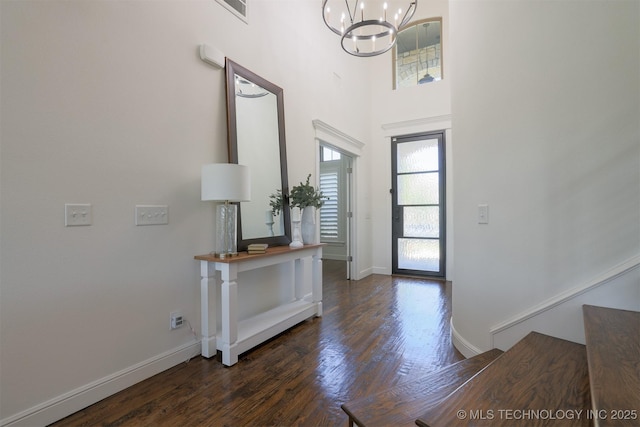 16958 E 45th St, Tulsa, OK 74134 - entrance foyer featuring a chandelier, dark wood finished floors, and a high ceiling