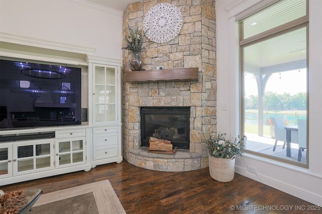 16958 E 45th St, Tulsa, OK 74134 - living room with ornamental molding, dark wood-style floors, and a fireplace