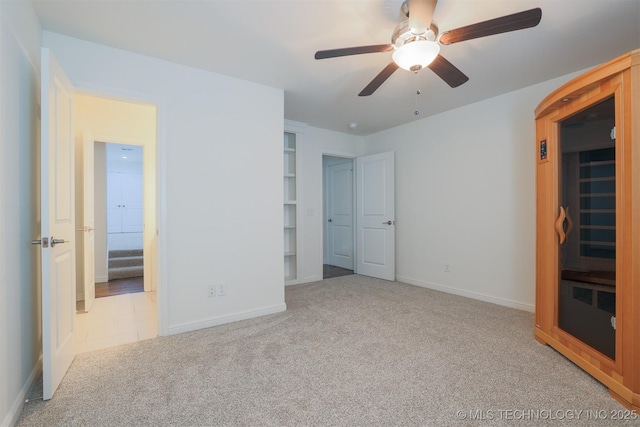 16958 E 45th St, Tulsa, OK 74134 - unfurnished bedroom featuring carpet and a ceiling fan